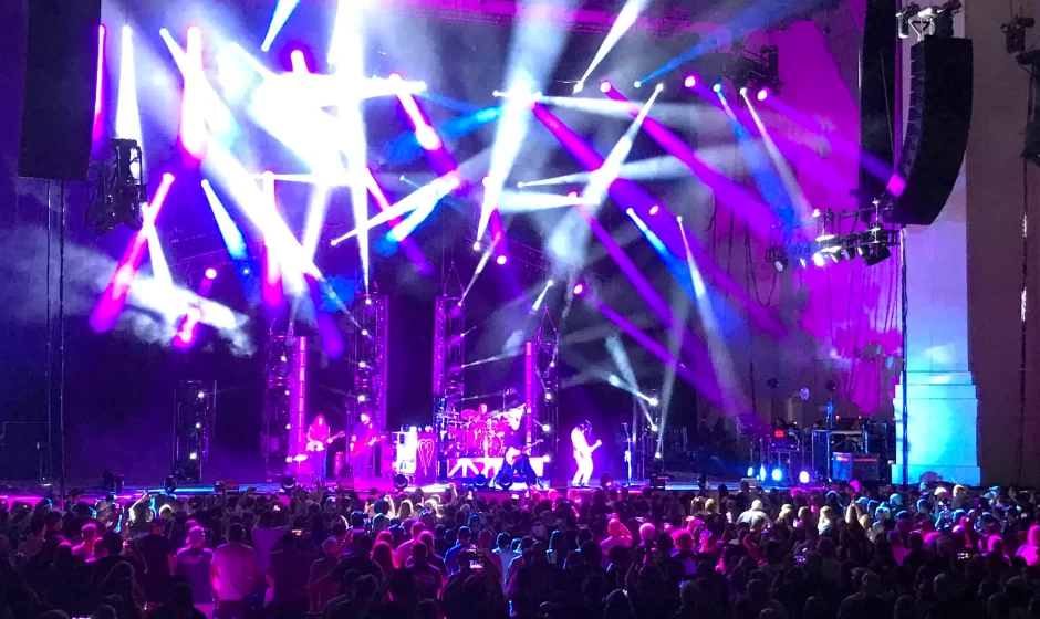 The Orion Amphitheater featuring a premier entertainment event with a lively band performing in front of an enthusiastic audience